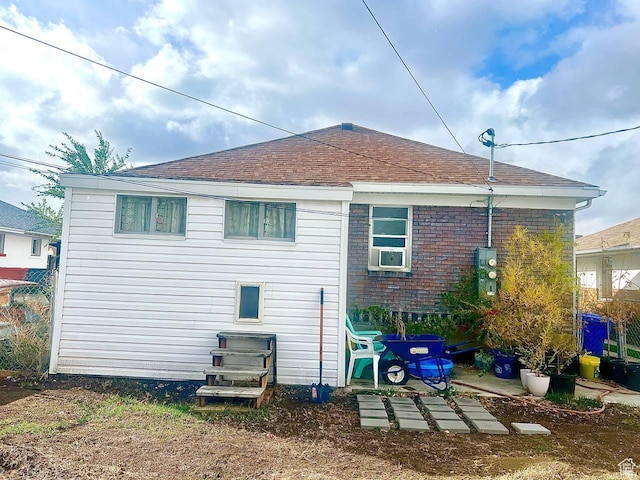 7659 S Lincoln St, Midvale, UT 84047 - rear view of property with a shingled roof