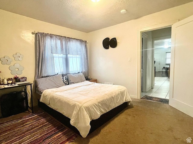 7659 S Lincoln St, Midvale, UT 84047 - carpeted bedroom with a textured ceiling