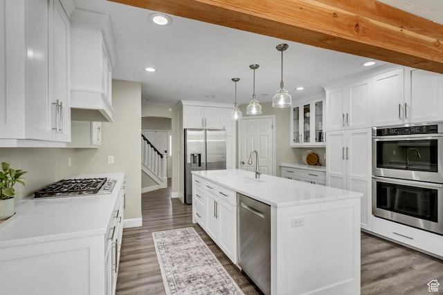 6063 S Kamas Dr W, Taylorsville, UT 84129 - kitchen featuring stainless steel appliances, white cabinetry, wood finished floors, and recessed lighting