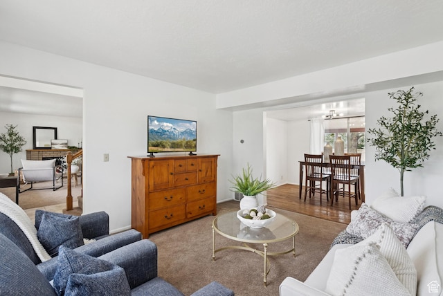 1074 E Spring Ridge Dr, Sandy, UT 84094 - carpeted living area with a chandelier