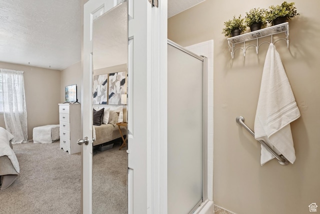 1074 E Spring Ridge Dr, Sandy, UT 84094 - full bathroom featuring connected bathroom, a stall shower, and a textured ceiling