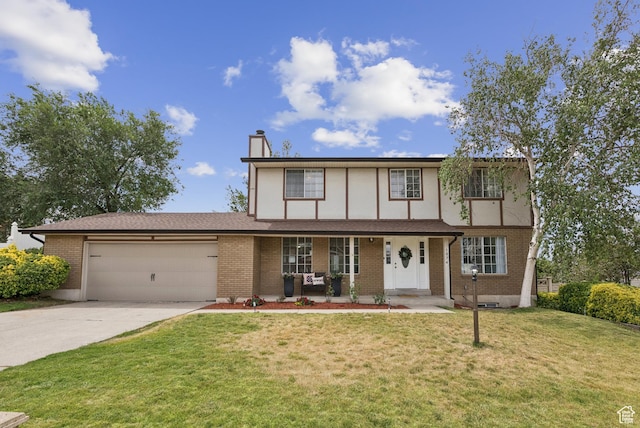 1074 E Spring Ridge Dr, Sandy, UT 84094 - tudor-style house featuring a porch, an attached garage, driveway, a chimney, and a front yard