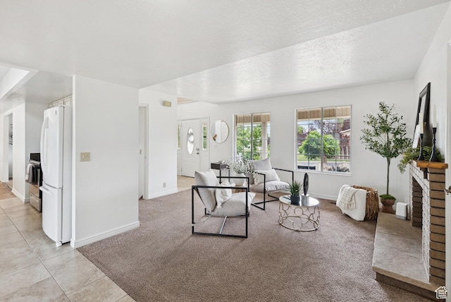 1074 E Spring Ridge Dr, Sandy, UT 84094 - living room featuring light colored carpet, a brick fireplace, and light tile patterned floors