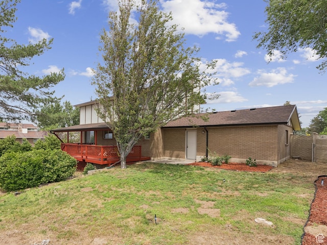 1074 E Spring Ridge Dr, Sandy, UT 84094 - rear view of property with a wooden deck and brick siding