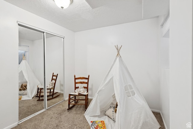 1074 E Spring Ridge Dr, Sandy, UT 84094 - playroom featuring carpet and a textured ceiling