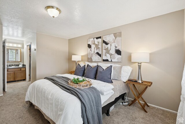 1074 E Spring Ridge Dr, Sandy, UT 84094 - bedroom featuring light carpet and ensuite bath