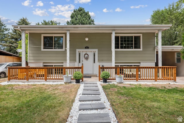 601 E Hilo St S, Sandy, UT 84070 - split foyer home with a front yard and a porch