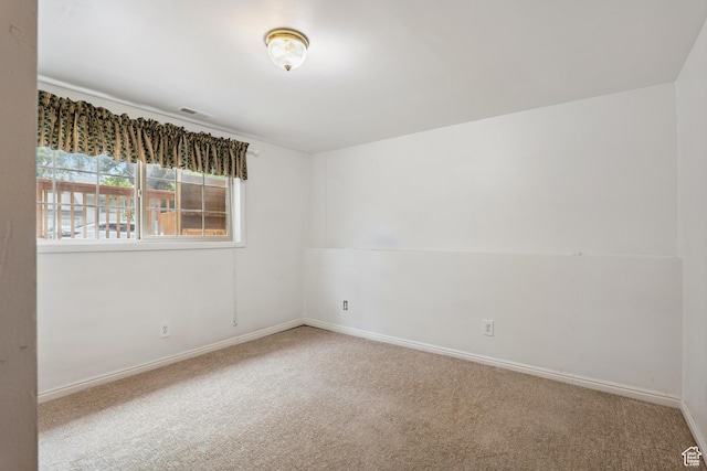 601 E Hilo St S, Sandy, UT 84070 - spare room featuring carpet flooring and baseboards