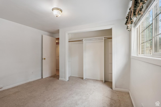 601 E Hilo St S, Sandy, UT 84070 - unfurnished bedroom with light colored carpet and a closet