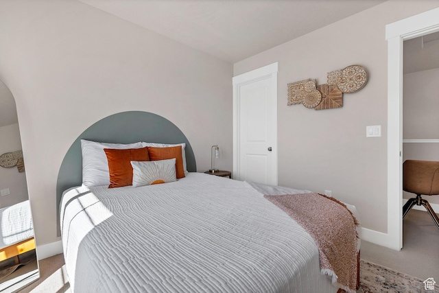 1210 N Mistico Aly, Washington, UT 84780 - bedroom with carpet flooring and arched walkways