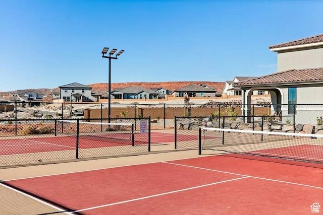 1210 N Mistico Aly, Washington, UT 84780 - view of tennis court with a residential view