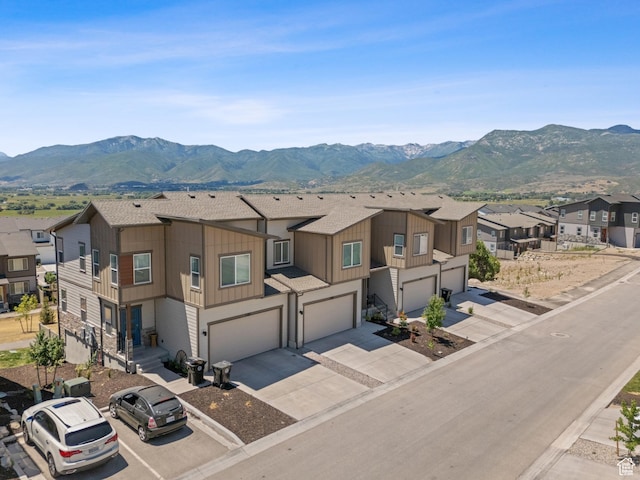 2309 N Wildwood Ln, Heber City, UT 84032 - view of front of home featuring an attached garage, a mountain view, a residential view, and driveway