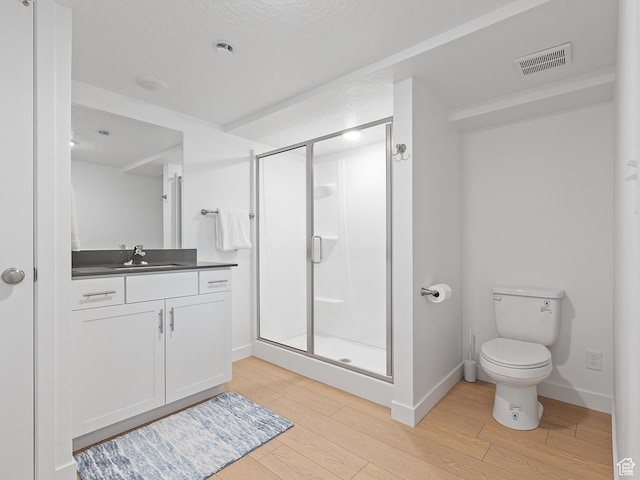 2309 N Wildwood Ln, Heber City, UT 84032 - bathroom featuring wood finished floors, vanity, and a shower stall