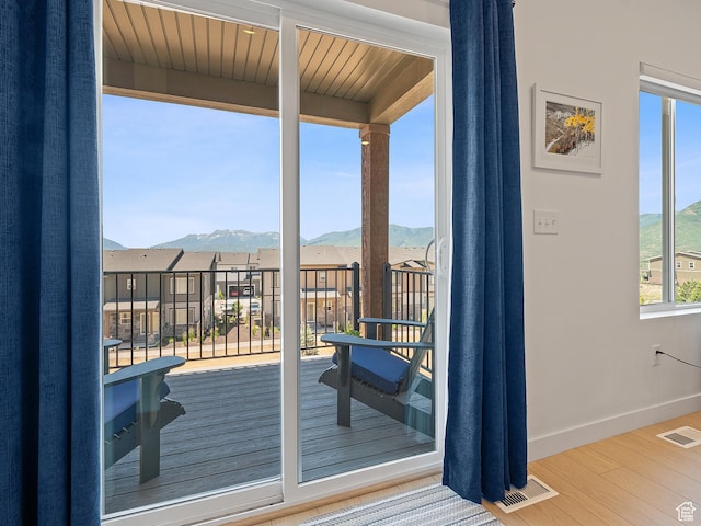 2309 N Wildwood Ln, Heber City, UT 84032 - doorway to outside featuring a mountain view, wood finished floors, and a residential view