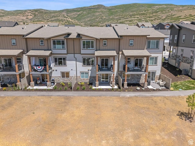 2309 N Wildwood Ln, Heber City, UT 84032 - view of front of property with a mountain view, board and batten siding, stone siding, and a residential view