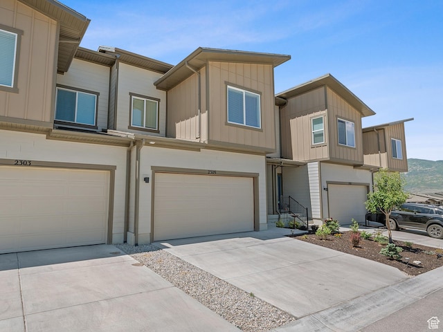 2309 N Wildwood Ln, Heber City, UT 84032 - multi unit property featuring an attached garage, driveway, and board and batten siding