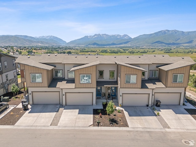 2309 N Wildwood Ln, Heber City, UT 84032 - townhome / multi-family property with an attached garage, driveway, and board and batten siding