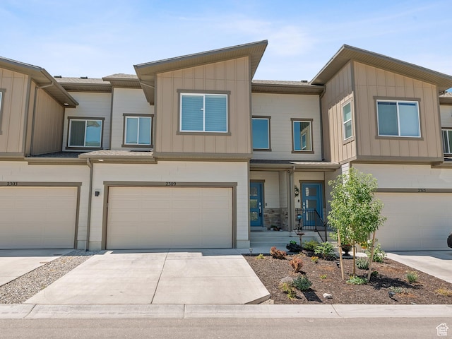 2309 N Wildwood Ln, Heber City, UT 84032 - multi unit property with an attached garage, board and batten siding, and driveway