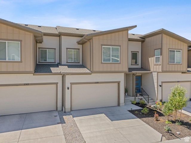 2309 N Wildwood Ln, Heber City, UT 84032 - multi unit property featuring an attached garage, board and batten siding, driveway, and a shingled roof