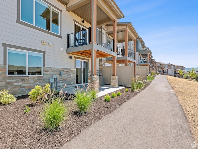 2309 N Wildwood Ln, Heber City, UT 84032 - view of side of home with a balcony and stone siding