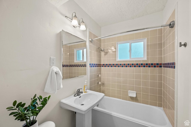 555 E 100 S Unit 303, Salt Lake City, UT 84102 - bathroom featuring shower / bath combination and a textured ceiling