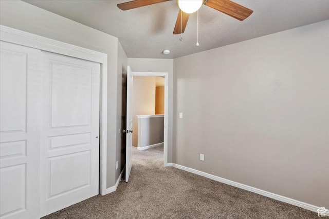 164 S 2875 W, West Point, UT 84015 - unfurnished bedroom with carpet flooring, a closet, and a ceiling fan