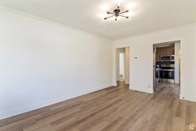 178 Country Club Dr, South Ogden, UT 84405 - spare room with wood finished floors, crown molding, and a textured ceiling