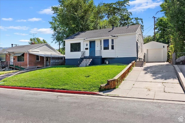 178 Country Club Dr, South Ogden, UT 84405 - view of front of house featuring an outdoor structure, a detached garage, a front lawn, and concrete driveway
