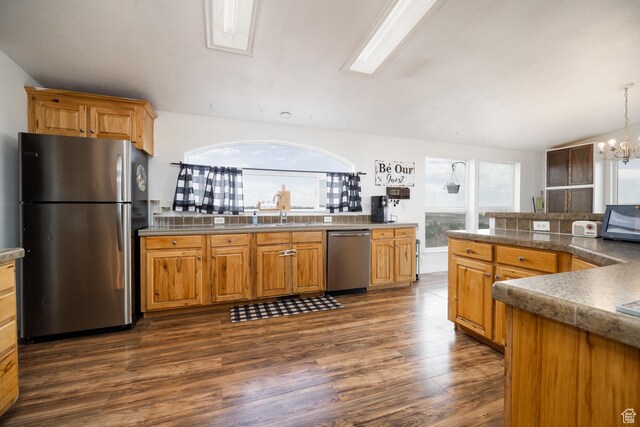 170 S 20300 W, Duchesne, UT 84021 - kitchen featuring appliances with stainless steel finishes, plenty of natural light, dark wood-style flooring, and a chandelier