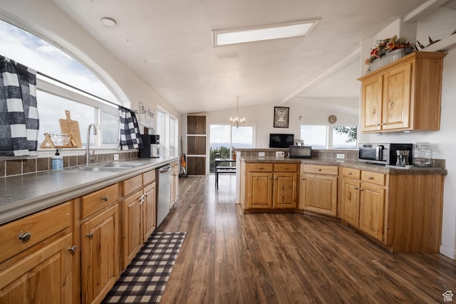 170 S 20300 W, Duchesne, UT 84021 - kitchen featuring appliances with stainless steel finishes, dark wood-style floors, a chandelier, a peninsula, and lofted ceiling