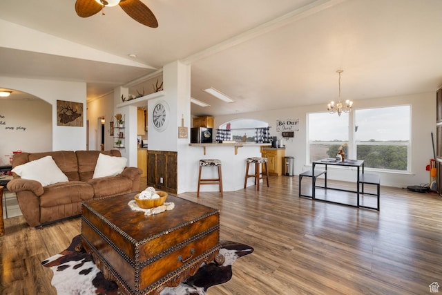 170 S 20300 W, Duchesne, UT 84021 - living room with arched walkways, ceiling fan, lofted ceiling, wood finished floors, and a chandelier