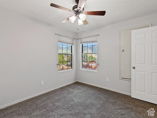 466 E 3460 N, North Ogden, UT 84414 - empty room featuring carpet and ceiling fan