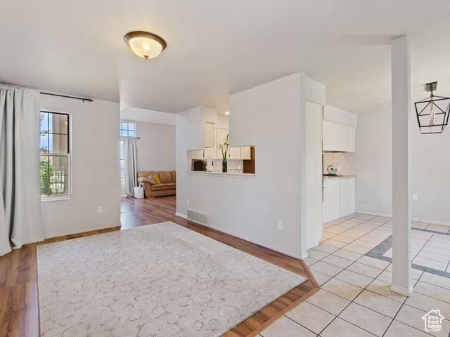 466 E 3460 N, North Ogden, UT 84414 - empty room with light wood-style floors and baseboards