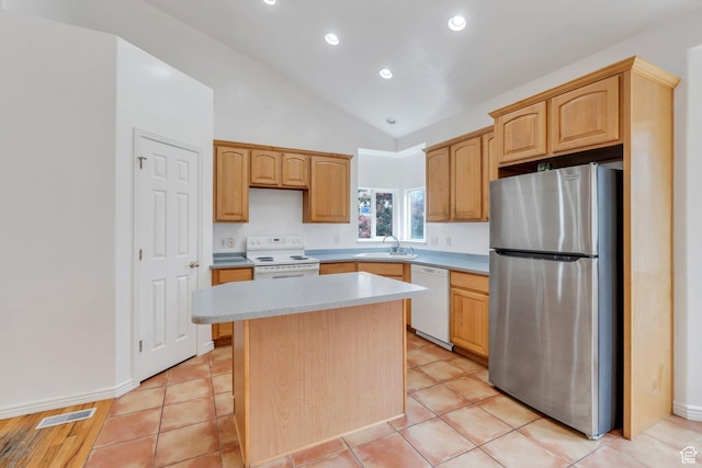 1430 S Heather Ln, Syracuse, UT 84075 - kitchen with white appliances, vaulted ceiling, light countertops, a kitchen island, and recessed lighting