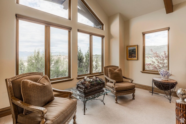 223 N Ibapah Peak Dr, Heber City, UT 84032 - sitting room featuring a mountain view, beam ceiling, and carpet