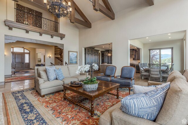 223 N Ibapah Peak Dr, Heber City, UT 84032 - living room with high vaulted ceiling, beam ceiling, a chandelier, and recessed lighting