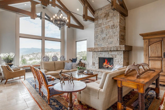 223 N Ibapah Peak Dr, Heber City, UT 84032 - living area with high vaulted ceiling, beamed ceiling, a mountain view, stone tile flooring, and a fireplace