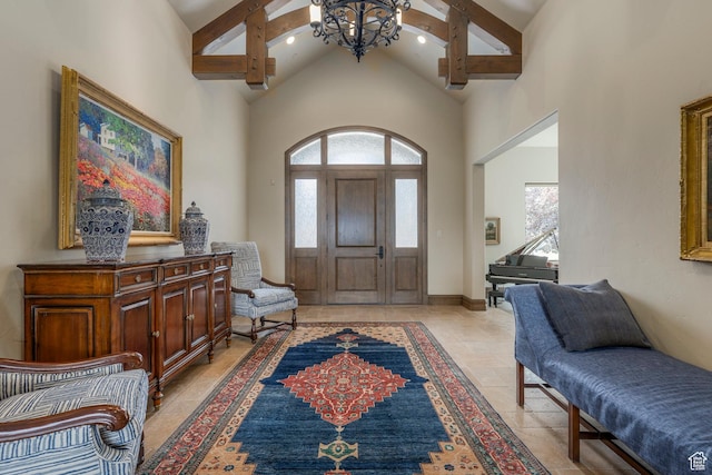 223 N Ibapah Peak Dr, Heber City, UT 84032 - foyer entrance with high vaulted ceiling, healthy amount of natural light, beamed ceiling, a chandelier, and recessed lighting