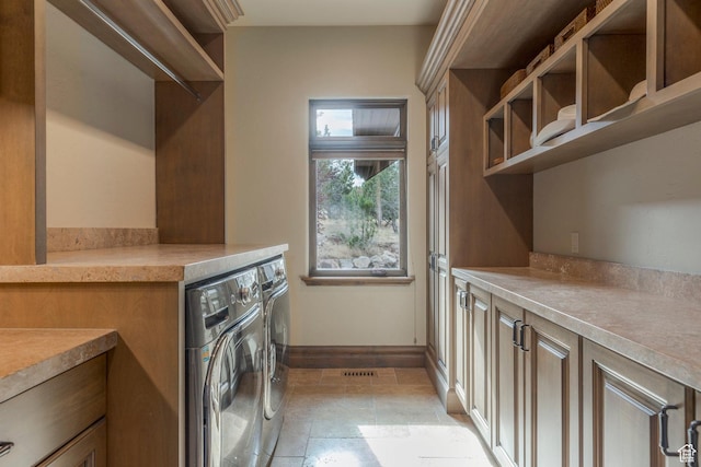 223 N Ibapah Peak Dr, Heber City, UT 84032 - laundry room with washer and clothes dryer and cabinet space