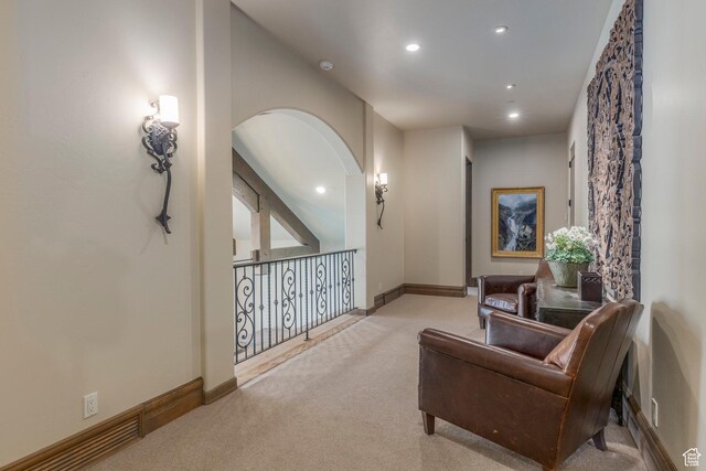223 N Ibapah Peak Dr, Heber City, UT 84032 - living area featuring carpet, arched walkways, and recessed lighting