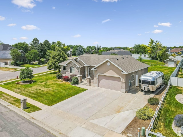 868 W Brandon Dr S, Kaysville, UT 84037 - view of front of home featuring concrete driveway, stucco siding, a garage, and a residential view