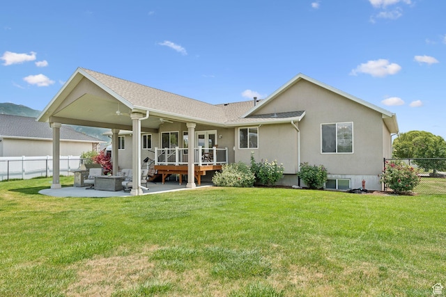 868 W Brandon Dr S, Kaysville, UT 84037 - back of house featuring a patio, a ceiling fan, a wooden deck, and stucco siding
