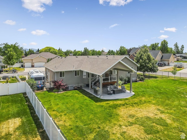 868 W Brandon Dr S, Kaysville, UT 84037 - back of property with an outdoor hangout area, a patio area, a fenced backyard, and a residential view