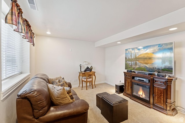 868 W Brandon Dr S, Kaysville, UT 84037 - living area featuring light colored carpet, recessed lighting, and a glass covered fireplace