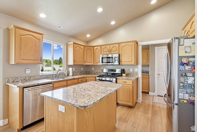 868 W Brandon Dr S, Kaysville, UT 84037 - kitchen featuring appliances with stainless steel finishes, light brown cabinetry, light wood-style floors, recessed lighting, and a center island