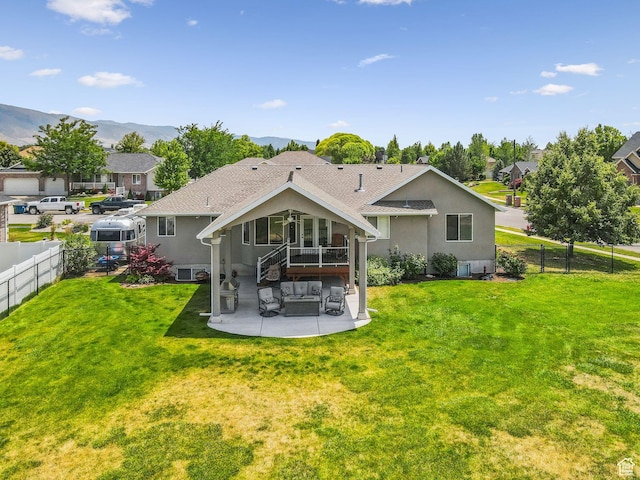 868 W Brandon Dr S, Kaysville, UT 84037 - rear view of house with a patio area, a fenced backyard, and stucco siding