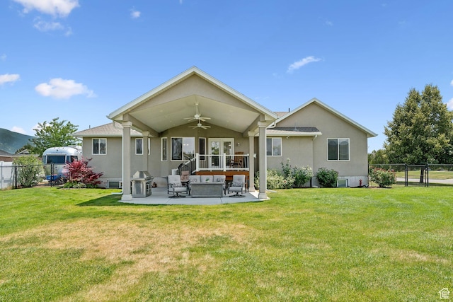 868 W Brandon Dr S, Kaysville, UT 84037 - rear view of property with ceiling fan, a patio area, stucco siding, a fenced backyard, and an outdoor living space