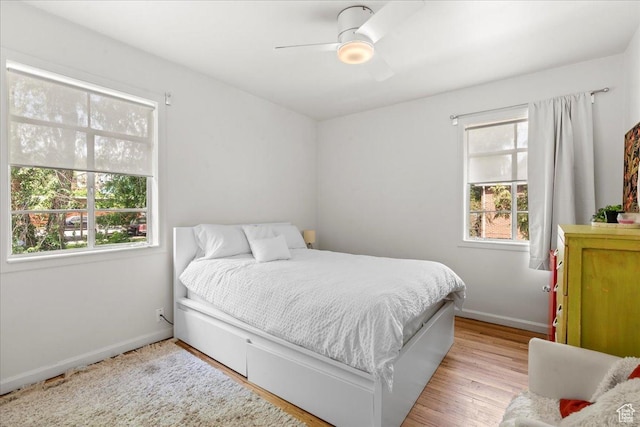 777 E 2nd Ave Unit 3, Salt Lake City, UT 84103 - bedroom with multiple windows, light wood-style flooring, and ceiling fan