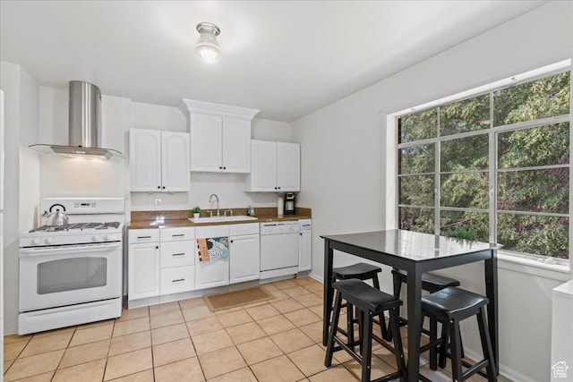 777 E 2nd Ave Unit 3, Salt Lake City, UT 84103 - kitchen with white appliances, wall chimney range hood, white cabinets, and plenty of natural light