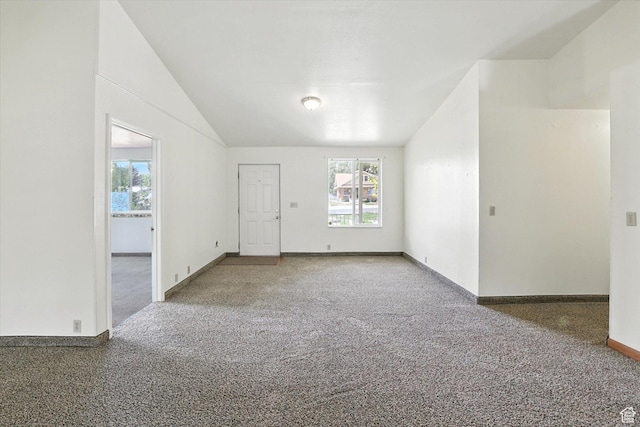 390 N 400 W, Malad City, ID 83252 - unfurnished room featuring plenty of natural light, carpet flooring, and vaulted ceiling